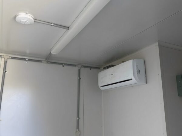 White-Modified-10ft-Shipping-Container-With-AC.jpg
